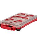 Packout Compact Low-Profile Tool Organizer with Transfer Tank Storage, impact-resistant red and clear gear bin, side view.