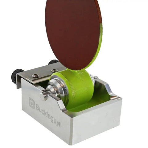 Close-up of Heavy Duty Aluminum Leather Edge Paint Roller Featuring Spring Loaded Tension Knurled Handle For Tweaking Pressure And Knocking Out Killer Leather Finishes Fast in use.