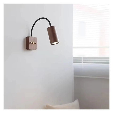 Modern Walnut Wall Sconce With 360 Degree Swivel Spotlight brings chill vibes to bedrooms with a stylish solid wood finish.