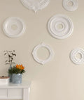 Wall with decorative ceiling medallions including Benson Ceiling Medallion 13 1/8 Inch Exterior Diameter, 8 Inch Interior Diameter, showing design.