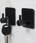 Heavy Duty Black Adhesive Hooks 6 Pack Wall Mount Hangers for Coat, Hat, Towel, Robe, Keys, Clothes Durable Aluminum Style on wall