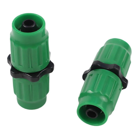 Grab This Awesome Quick Connect Repair Kit For Your 5/8 And 3/4 Inch Garden Hose. It Fits Any Stretch From 25 To 100 Feet Long. Durable green plastic hose repair fittings shown on white