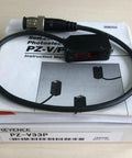 Keyence PZ-V33P Fiber Optic Sensor Replacement Part 1 Pack displayed on manual, cable shown, ideal for precise automation quality control.
