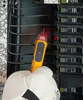 Gloved hand using Non-Contact Voltage Tester 50-600V CAT IV 600V NCVT With LED Indicator in electrical panel
