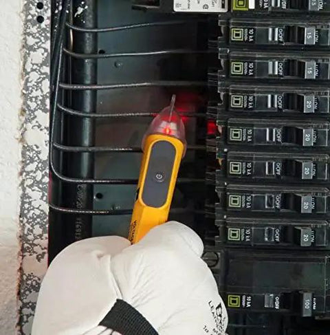 Gloved hand using Non-Contact Voltage Tester 50-600V CAT IV 600V NCVT With LED Indicator in electrical panel