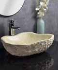 Top Shelf Stone Vessel Bathroom Sink Ideal For Countertops Or Patios Featuring A Slick Smooth Bowl Interior And Rugged Outside Look That Is A Serious Space Upgrader, displayed with faucet and decor.
