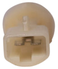 Close-up of beige brake master cylinder for 1990-2002 International 4700 with hydraulic booster