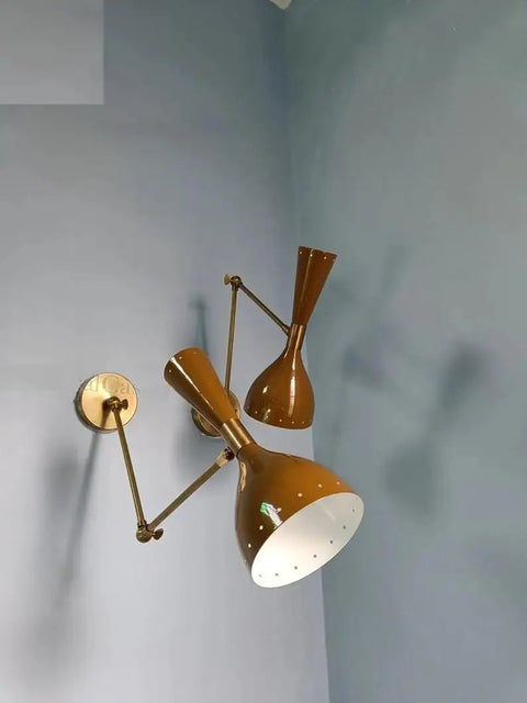 1950 Mid Century Italian Hardwire Brass Wall Sconce Pair Brown Wall Fixture Diabolo Lamp on wall with unique brown shades.