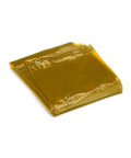Folded gold PVC welding curtain with UV and blue light shielding, ready to hang with grommets, flame mildew and water resistant.