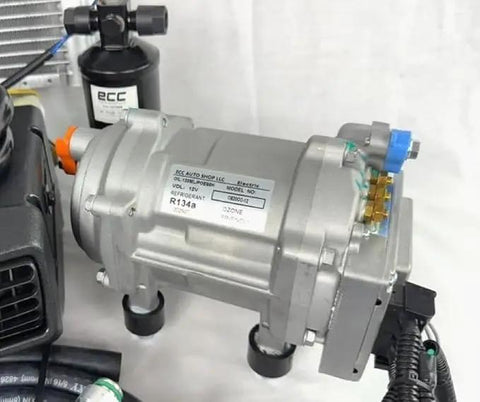 Universal Underdash Air Conditioning Kit With Aluminum Condenser And Wiring Harness 12 Volt DC Evaporator compressor close-up showing detail and components.
