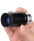 Person holding Awesome 32mm Plossl Eyepiece For 1.25 Inch Telescopes With Filter Thread, 52 Degree Field Of View, Long Eye Relief, Multi Coated Optics.