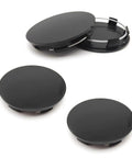 4 Pack Universal Car Wheel Center Caps Sixty Millimeter Outer Diameter Fifty Six Millimeter Inner Bore Tough As Nails ABS Plastic Snap On Rim Hub Caps, black color, showing three caps with one cap upside down.