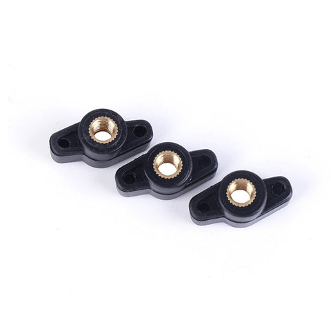 Front view of three black plastic wing knobs with brass 1/4-20 threaded inserts for through-hole T-track fixtures.