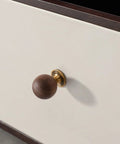 Installed 10 Pack Walnut Wood Sphere Cabinet Pulls With Copper Base 1.18 Inch on white drawer front