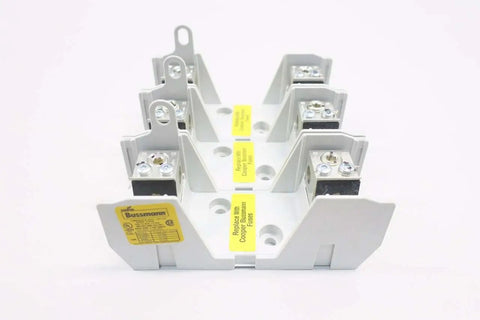 Pro Grade Rock Solid 3 Pole Fuse Holder Offering Hella Durable 100 Amp Rating And 600 Volt Ac Capacity For Heavy Duty Industrial Wiring And Quick Fit Panel Jobs, showing three contact slots.
