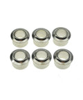 Six nickel-plated metal guitar tuner bushings with knurled outer edges and central hollow bore (front view).