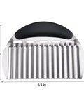 Stainless steel crinkle cutter with black ergonomic handle; 6.5 in wide by 4.7 in tall for potatoes and vegetables.