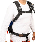Man wearing Hydro Lite BC Ultralight Travel Harness BCD with 30 lb lift aircell for scuba divers, X-Large, black/blue in use