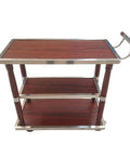 Tough As Nails Heavy Duty Industrial Kitchen Cart With Smooth Rolling Wheels And Built In Wine Rack Three Tier Storage Trolley in stainless steel and wood design.