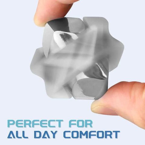 Person holding a silver Multimode Fidget Cube Spinner 2 In 1 Gyro Metal Desk Gadget For Focus And Relaxation with blurred motion.