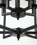Close-up of black steel frame on Industrial Rustic Pendant Light Chandelier With Five Lights, Adjustable Height E12 Vintage Hanging Fixture