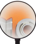 Smooth Operator V Groove Deep Groove Ball Bearing 12X41X20MM viewed through lens, showcasing internal design and build quality.