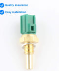 Coolant temperature sensor, close-up view, green connector and brass threaded probe
