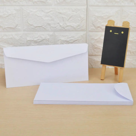 White Blank Paper Envelopes Set 20 Pack For Mail And Storage Reusable No Word Design Letter Envelopes on desk