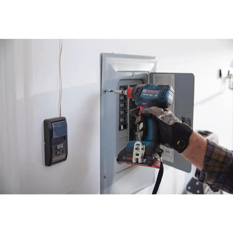 Using 18V All In One Impact Driver And Wrench Kit With One Quarter Inch Hex Shank And One Half Inch Square Drive on electrical panel