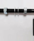 Close-up of Built Like A Tank Universal Steel J Bolt Gate Hinge with threaded rod, nuts, and pivot for heavy gates.
