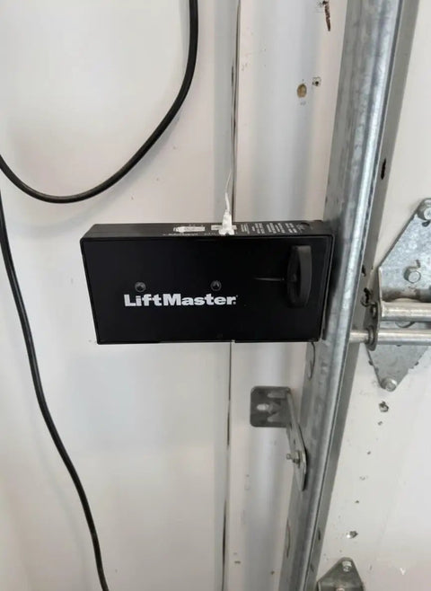 Power Lock 41A6102 Garage Door Opener Replacement Module for 3800 and 8500 Units installed on a garage door track