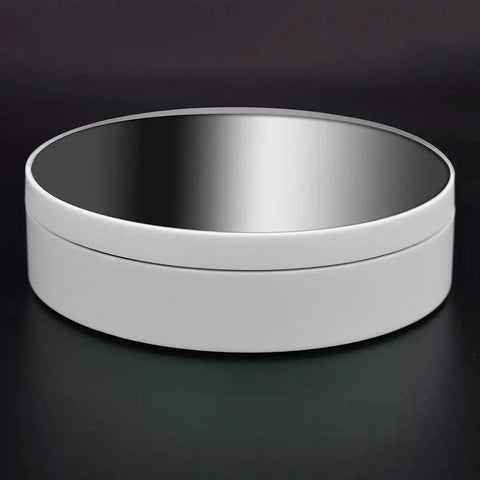 KobeIeen Electric Jewelry Turntable Display With 3 Speed Settings, sleek round shape, sturdy white ABS material, reflective mirror finish.