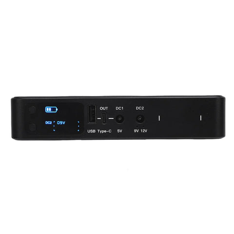 Heavy Duty Ups Power Supply 18000Mah Battery Backup, black with ports for USB and DC, digital display for usage monitoring.