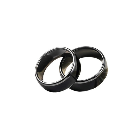 Two black ceramic RFID UID rings for Access Control, featuring 125kHz and 13.56MHz frequency, ISO14443A UID Changeable Chip Wearable Tech.