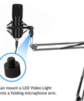 Slick 1/4 Male To 3/8 Female Thread Adapter With Double Head Stud Bolt Gonna Fit Camera Cage Light Stand Monopod Shoulder Rig Tripod Black conversion plate connecting a microphone and light arm.