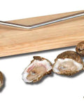 Premium Stainless Steel Oyster Opener with Knife on Wooden Base for Easy Shucking and Quick Oyster Opening, shown with opened oysters