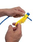 Hands using tool from Coax Installation Kit With Crimp Tool, Cable Cutter, Stripper, F Connectors And Storage Bag