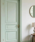 Easy Install 12 Pc Unfinished 3D Wood Trim Molding for Walls Doors Furniture Peel And Stick on a mint green door.