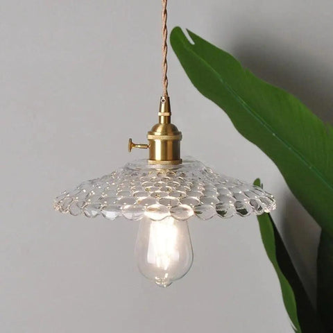 UIOLCFF Classic Creative Personality Nordic Minimalist Glass Shade Single-Head Hanging Light with gold fixture and clear shade.