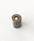 Waterjet abrasive cutting head bushing, metal cylinder with central through-hole