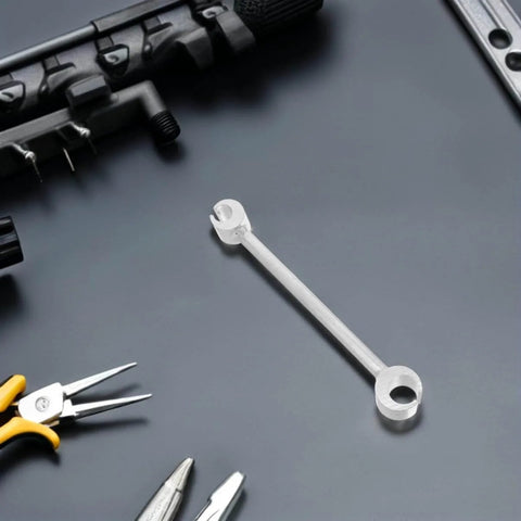 Adjustable Hinge Gap Tool Heavy Duty Wrench For Precision Door Hinge Alignment And Repair Fits Fireproof Doors And Multiple Hinge Types Portable DIY Friendly Tool For Home And Commercial Use on black surface surrounded by tools.