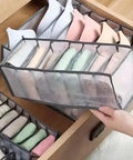 3 Piece Foldable Underwear Drawer Organizer Set For Bras Socks And Lingerie Multi Grid Closet Storage Bins crafted from durable Oxford fabric, holding neatly folded bras.