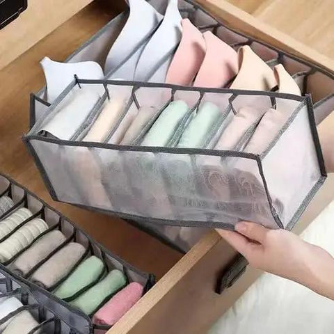 3 Piece Foldable Underwear Drawer Organizer Set For Bras Socks And Lingerie Multi Grid Closet Storage Bins crafted from durable Oxford fabric, holding neatly folded bras.