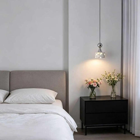 Terrazzo Small Pendant Light, 4.7 Inch Chrome Hanging Fixture above bedside table with flowers and cozy bedding.