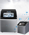 Heavy Duty Countertop Ice Maker Cranks Out Fifty Five Pounds Of Fresh Cube Ice Daily With Ridiculously Fast Twelve Minute Batch And Zero Drama Auto Clean System in stainless steel with ice cubes.