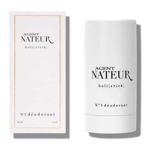 Holi No 3 Natural Deodorant Stick, aluminum free, next to packaging, 1.7 oz size, infused with lavandin and eucalyptus for odor control.