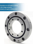 Pro Machine Shop Grade Robotic Arm Cross Roller Bearing Slewing Ring Assembly close-up view showing outer ring and bolt holes.