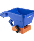 Blue handheld grass seed and fertilizer spreader for lawns and driveways, lightweight and corrosion resistant, ergonomic grip visible.