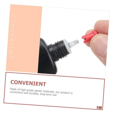 100 Pack Precision Eyelash Glue Bottle Nozzle Pins Anti Clog Plastic Tips Fits Standard Cosmetic Bottles, red insert on black bottle.