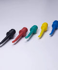 Set of 5 colorful insulated test hook clips for multimeter lead kit on white background showcasing safe nylon6 needle durable probes